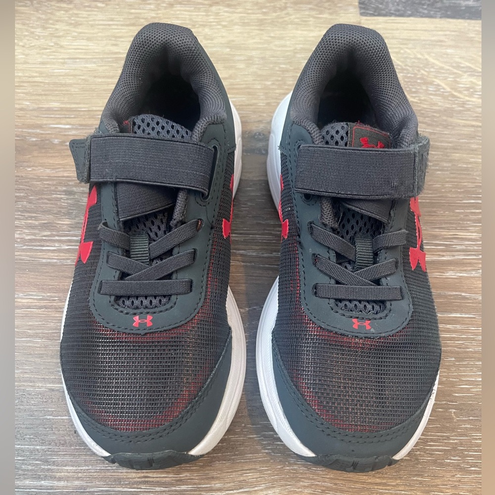 Under Armour kids shoes.